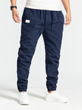 Men's Comfort Streetwear Tapered Pants - Mid Waist, Casual Drawstring Trousers with Belt, All-Season Durable Polyester