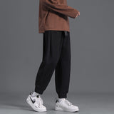 Men's Suit Pants Loose Fashion Solid Color Harem Pants Belt Design Hip Hop Male Casual Trousers New Streetwear