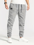 Men's Comfort Streetwear Tapered Pants - Mid Waist, Casual Drawstring Trousers with Belt, All-Season Durable Polyester